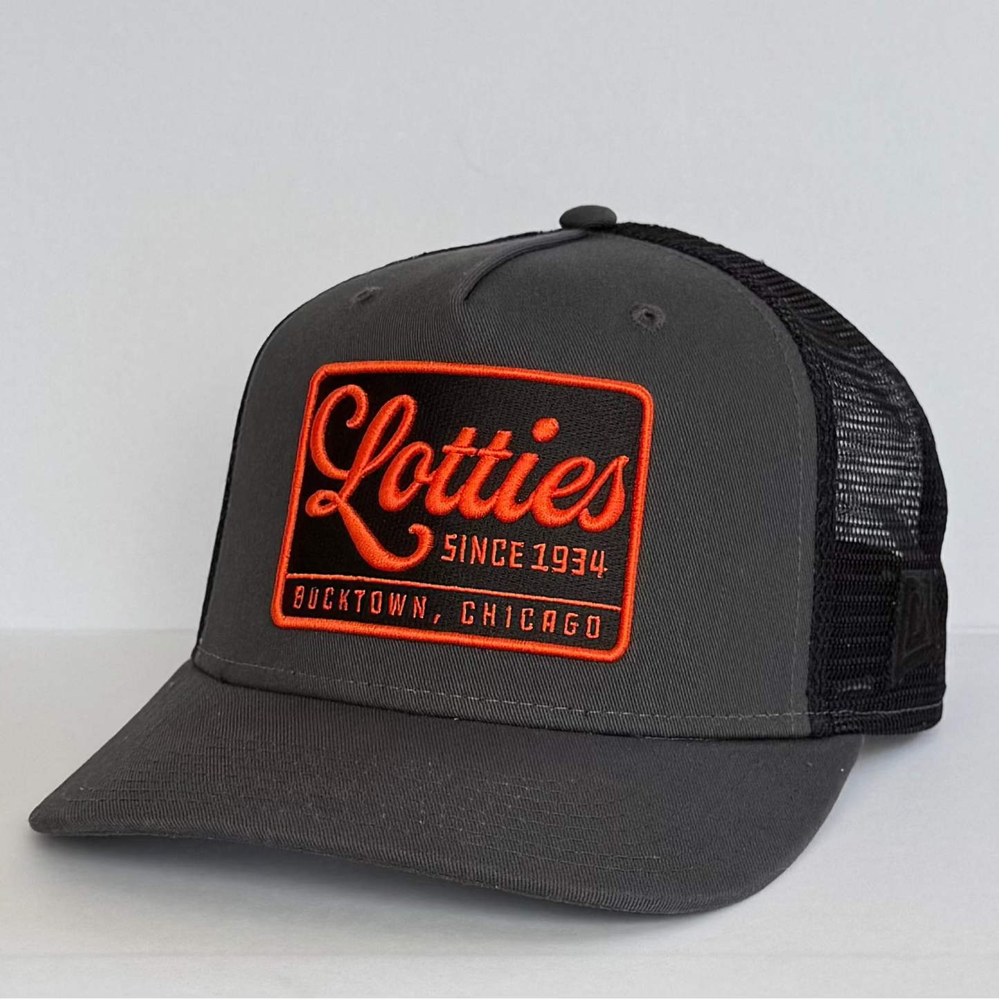 The Ember & Slate Lottie's Pub Trucker | Bucktown, Chicago Cap